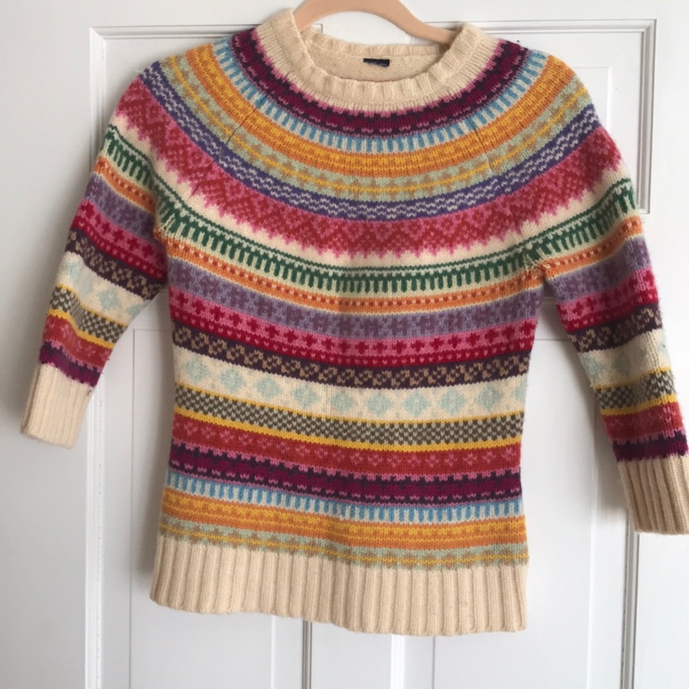 100% lambs wool will fit a Xs to small